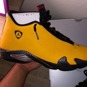 Jordan 14 reverse Ferrari “university gold”.